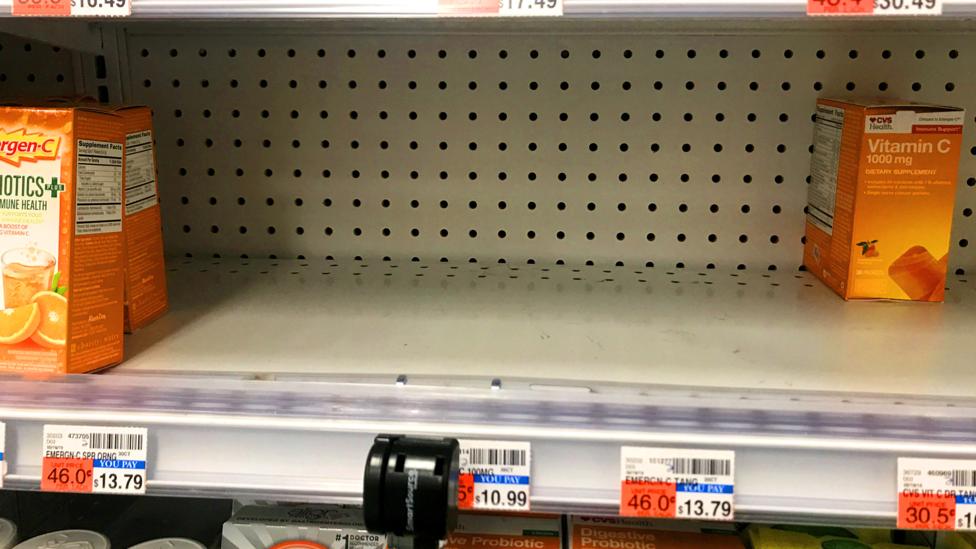 Empty vitamin shelves in a supermarket (Credit: Reuters)