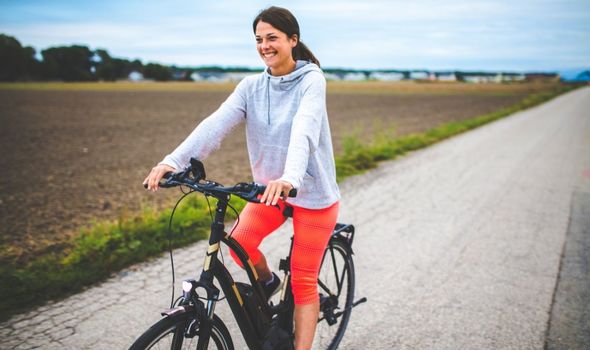 Cycling for weight loss: Woman cycling