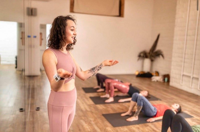 Brittney Morettini teaching her Pilates class before the pandemic closed all fitness facilities [Photo from Morettini’s Instagram account infernopilatesgirl and used with her permission]