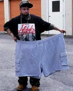 Jen Costa with the shorts she wore prior to her dramatic weight loss. (SWNS)