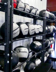 Exercise equipment at Always Forward CrossFit on South Main Street in Granville.