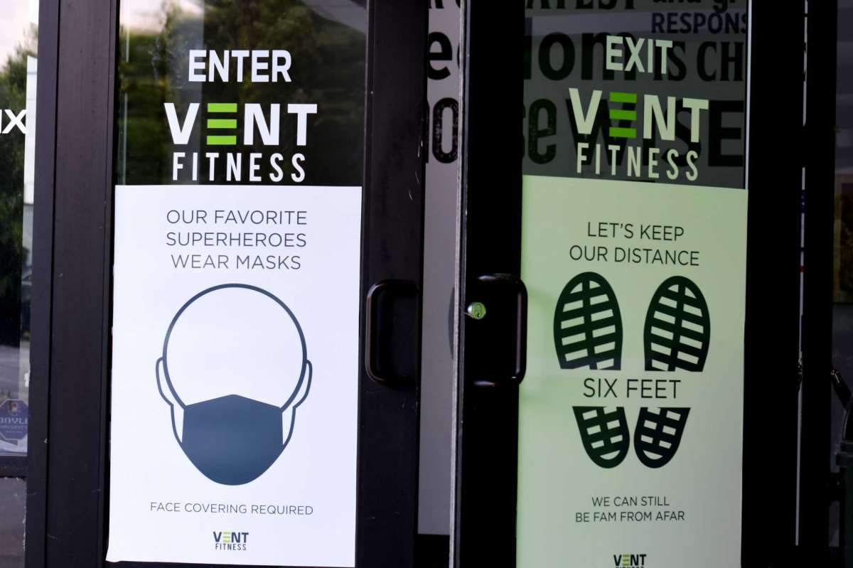 Coronavirus safety measure signs are posted at the Clifton Park Vent Fitness entrance on Tuesday, June 23, 2020, on Route 146 in Clifton Park, N.Y. Gym owners are frustrated with the lack of direction they are receiving from the state about when they can reopen. (Will Waldron/Times Union)